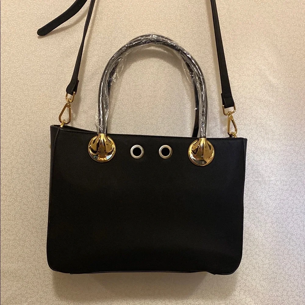 Elegant Black Handbag with Gold Accents